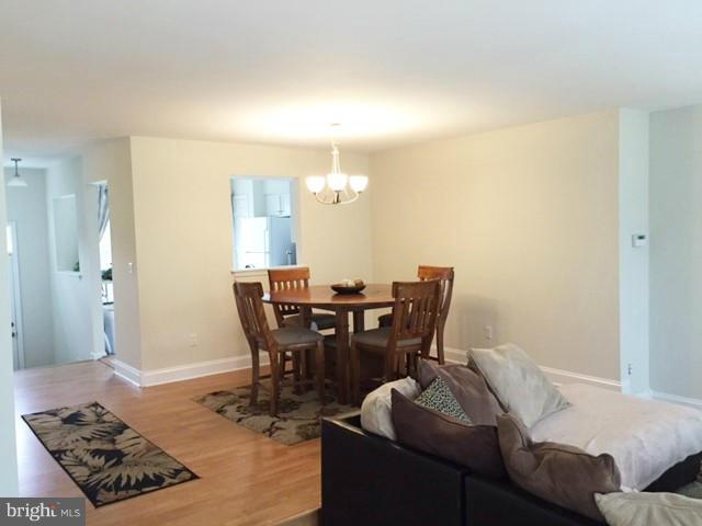 331 Davis Avenue Southwest Leesburg, VA 20175 - Photo 11 of 29 a living room with furniture and wooden floor