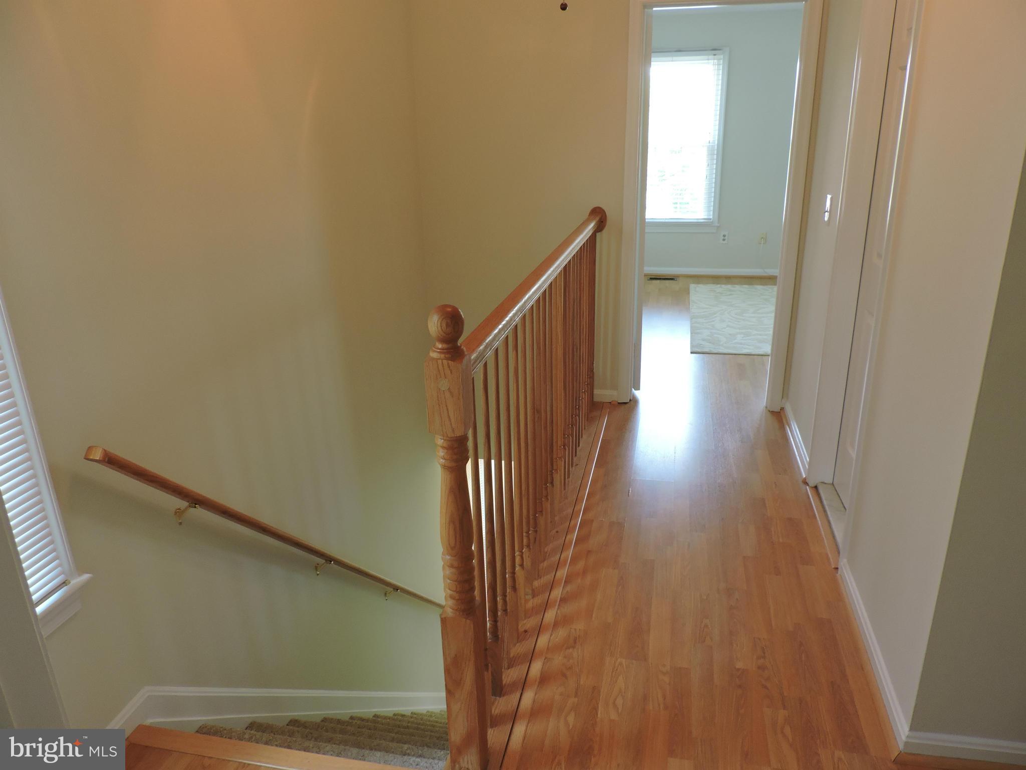 331 Davis Avenue Southwest Leesburg, VA 20175 - Photo 15 of 29 a view of a hallway with wooden floor
