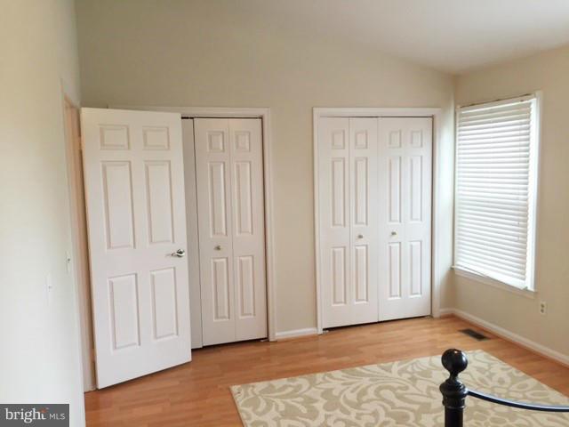 331 Davis Avenue Southwest Leesburg, VA 20175 - Photo 17 of 29 a view of an empty room with wooden floor and closet