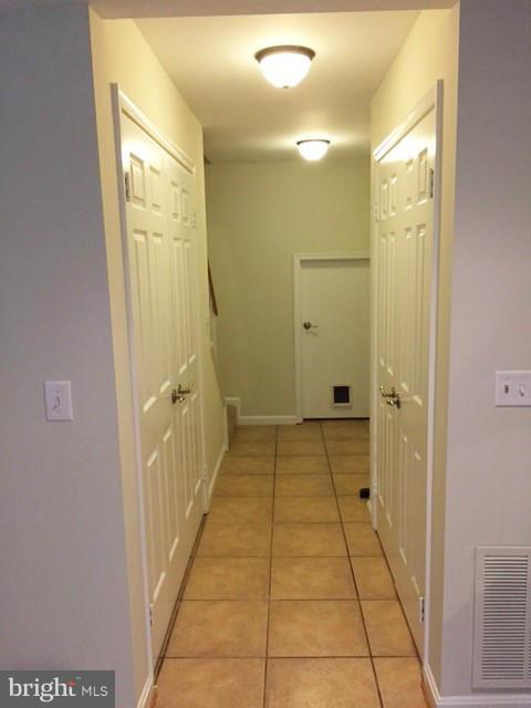 331 Davis Avenue Southwest Leesburg, VA 20175 - Photo 21 of 29 a bathroom with a glass door shower and a sink