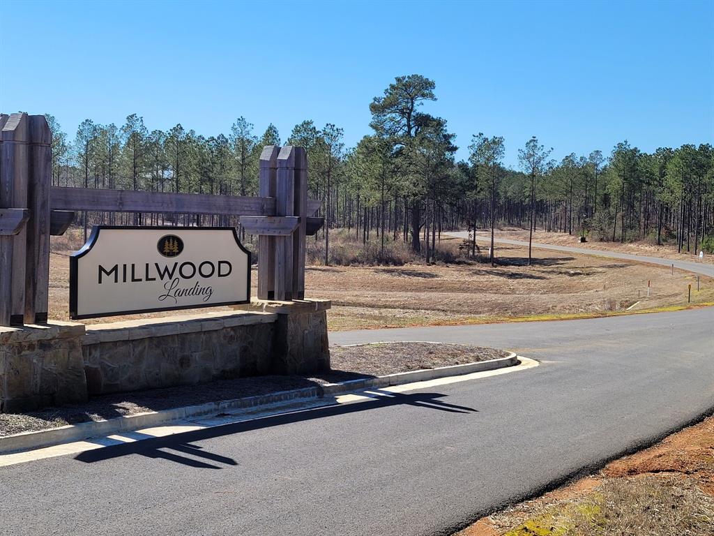 238 Millwood Loop, Unit 33 Minden, LA 71055 - Photo 17 of 17 a view of a street with benches in the background