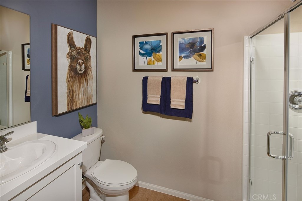 44376 Beringer Drive Indio, CA 92203 - Photo 12 of 17 a bathroom with a toilet and a sink