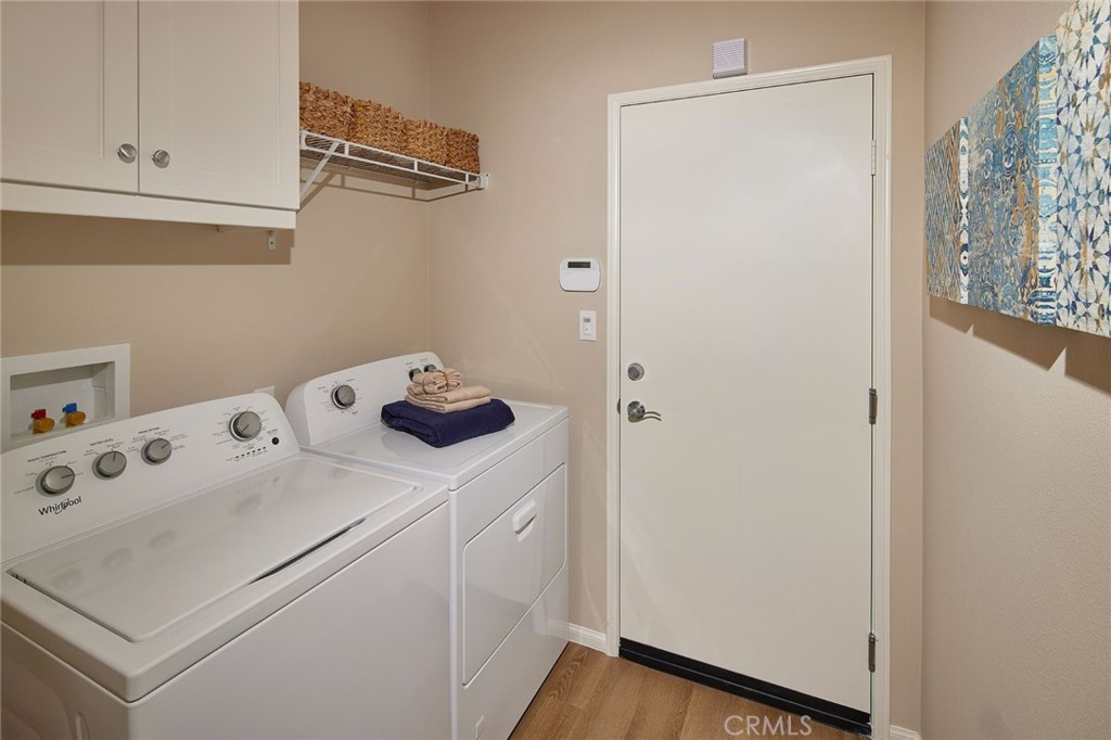 44376 Beringer Drive Indio, CA 92203 - Photo 16 of 17 a utility room with dryer and washer