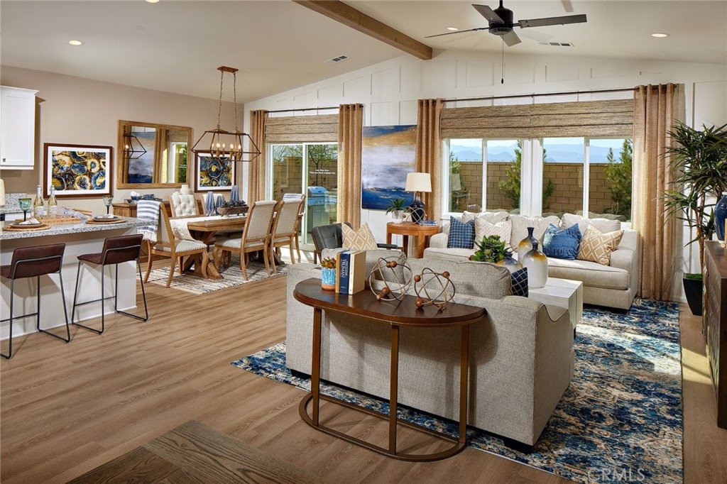 44376 Beringer Drive Indio, CA 92203 - Photo 5 of 17 a living room with furniture and a large window
