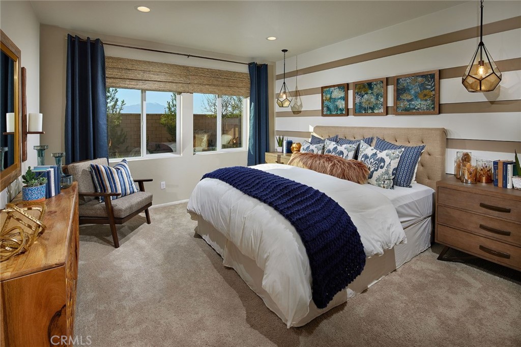 44376 Beringer Drive Indio, CA 92203 - Photo 9 of 17 a spacious bedroom with a bed and a large window