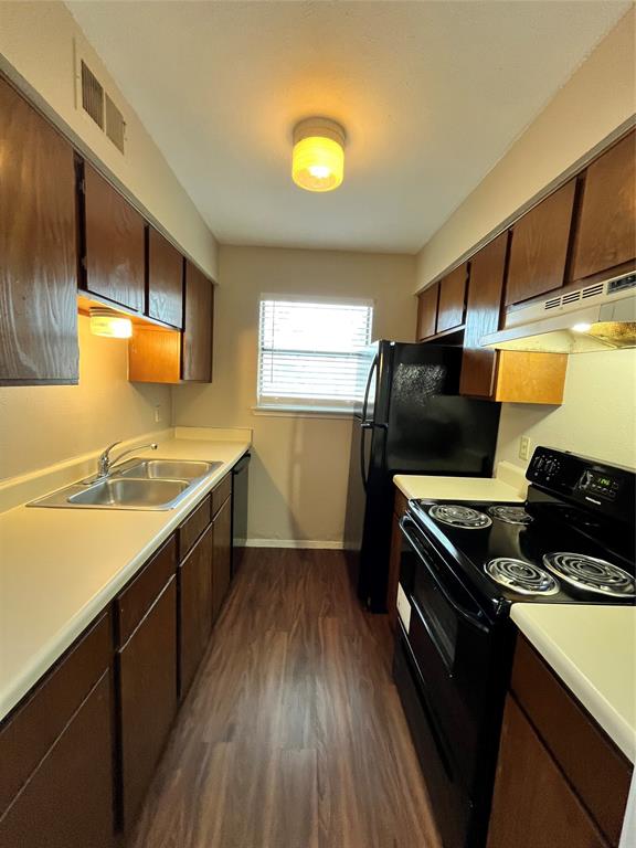 2526 West Prairie Street, Unit 108 Denton, TX 76201 - Photo 4 of 12 Here is a full view of this kitchen. Notice the natural lighting coming in from the window.
