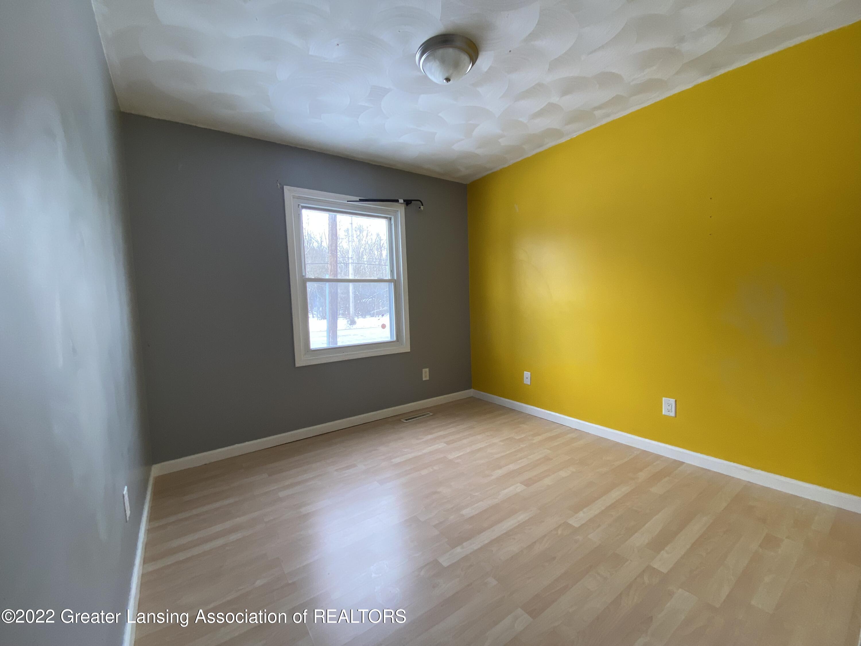 7015 North Aurelius Road Lansing, MI 48911 - Photo 15 of 30 2nd Bedroom