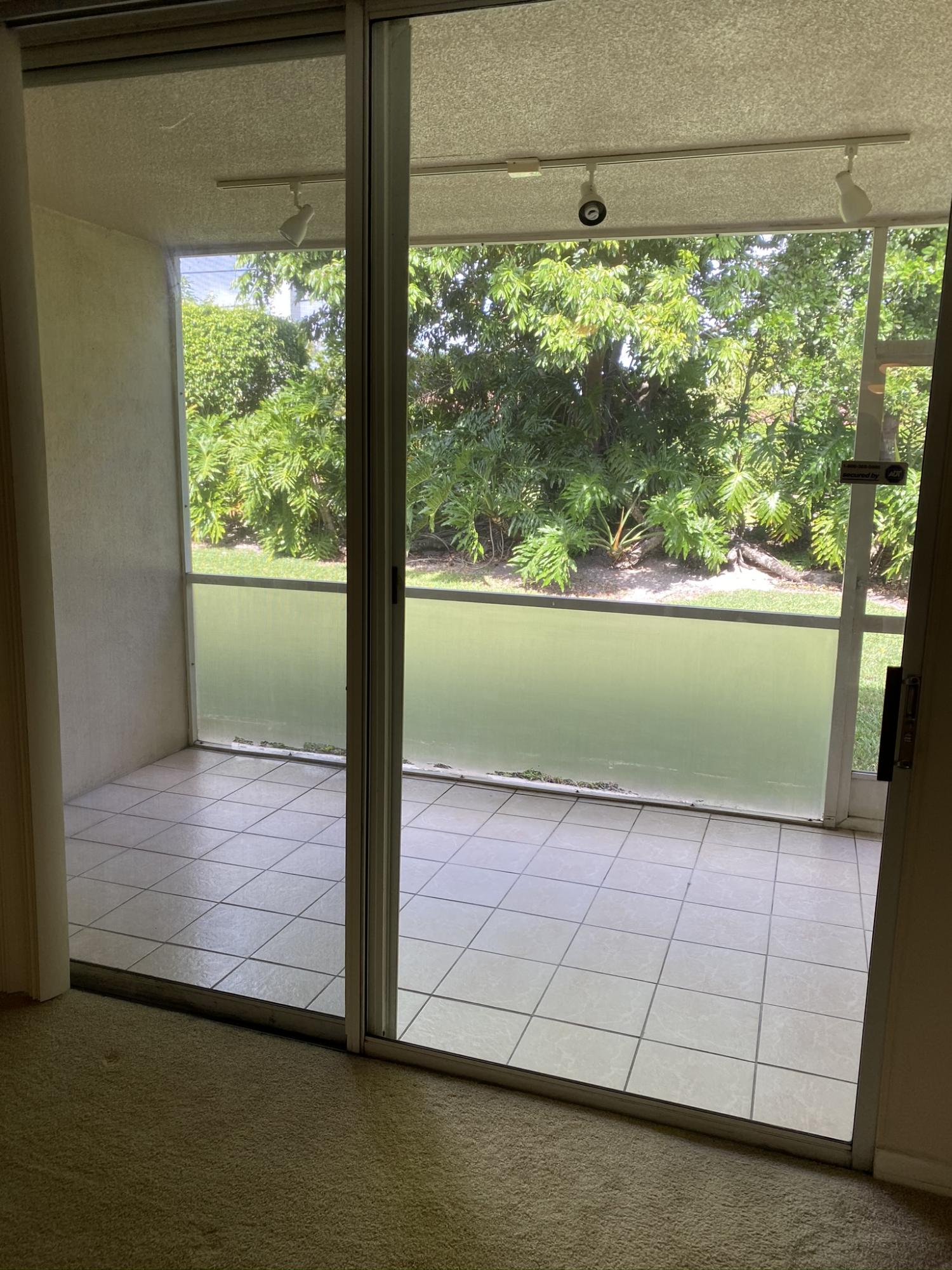 9275 Flynn Circle, Unit 3 Boca Raton, FL 33496 - Photo 6 of 13 IMG_2500