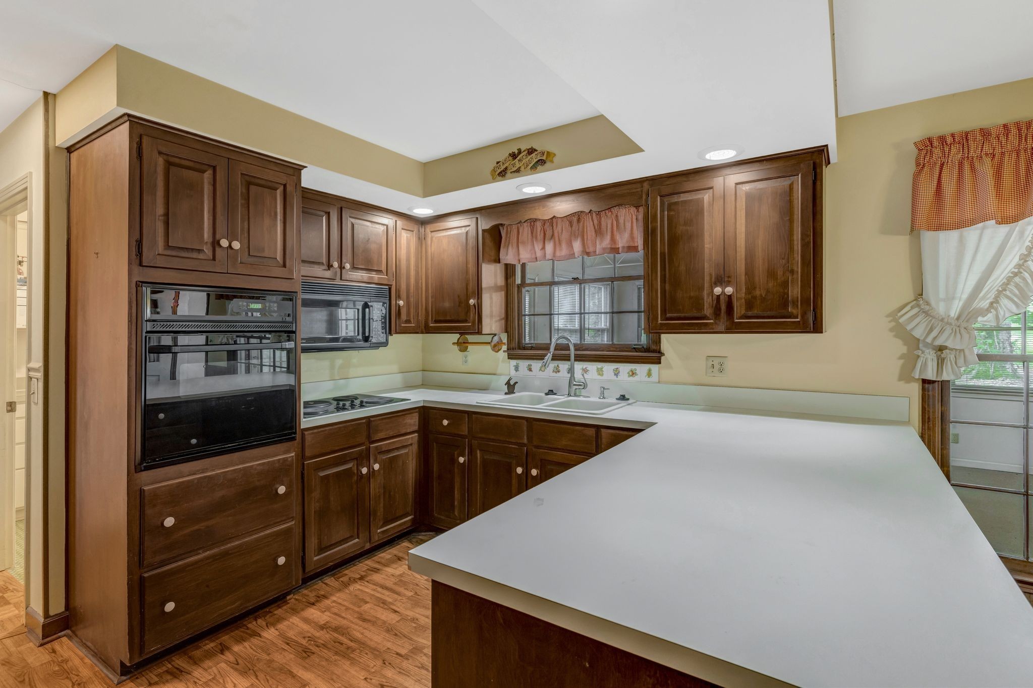 429 Nesbitt Lane Madison, TN 37115 - Photo 11 of 44 a kitchen with stainless steel appliances granite countertop a sink and cabinets