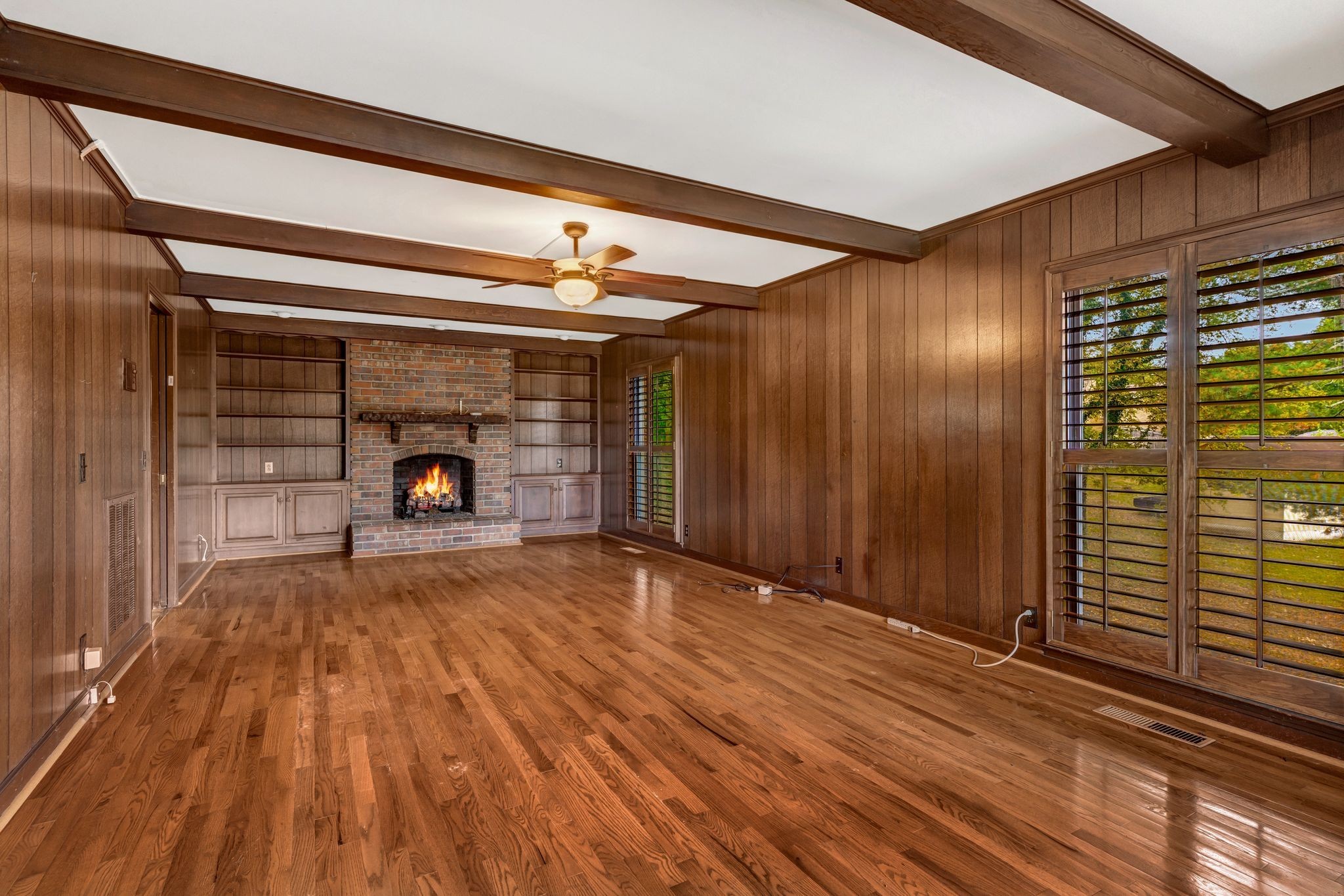429 Nesbitt Lane Madison, TN 37115 - Photo 13 of 44 a view of empty room with wooden floor and fireplace