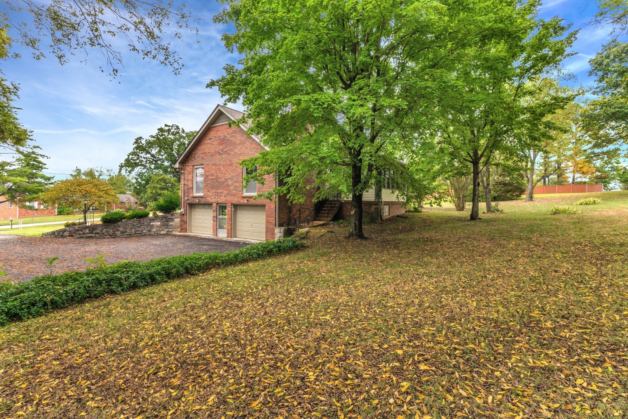 429 Nesbitt Lane Madison, TN 37115 - Photo 41 of 44 a backyard of a house with lots of green space