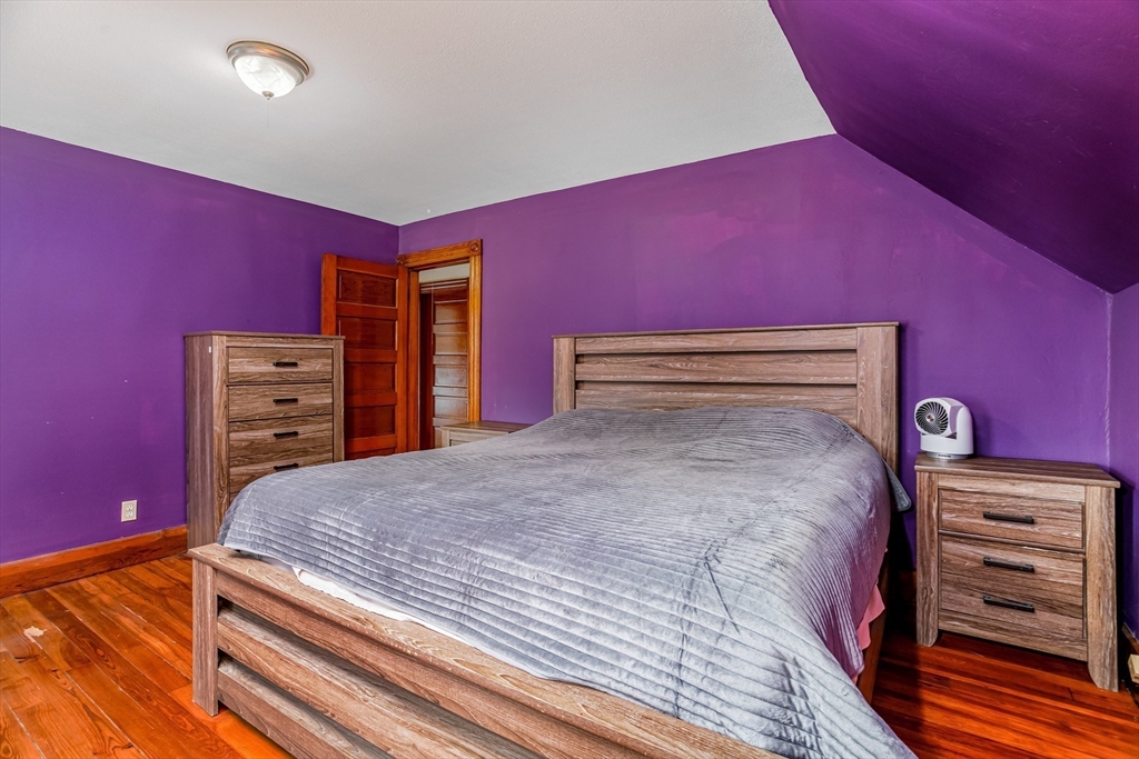 54 Charles Street Gardner, MA 01440 - Photo 21 of 40 a bedroom with a bed and a dresser