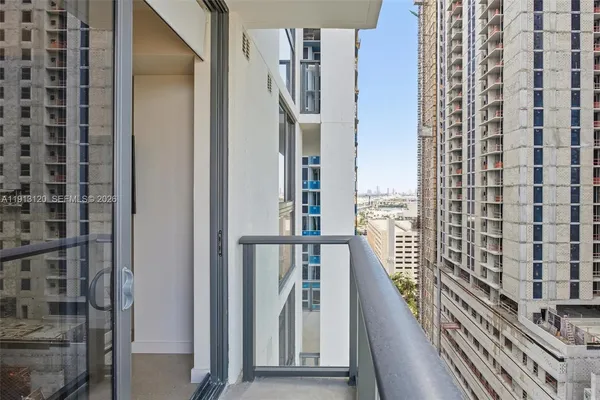 a spacious bathroom with a double vanity sink and a mirror