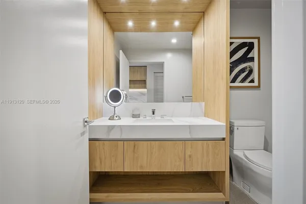 a kitchen with a washer and dryer