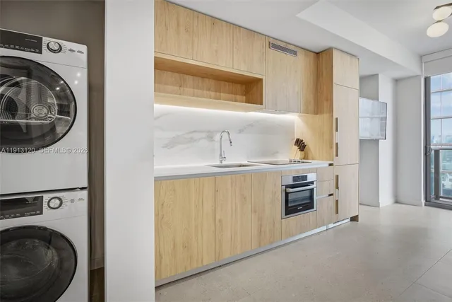 a view of swimming pool with outdoor seating and plants