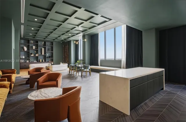 a living room with a couch and wooden floor