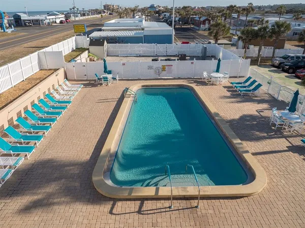 a view of a house with a swimming pool