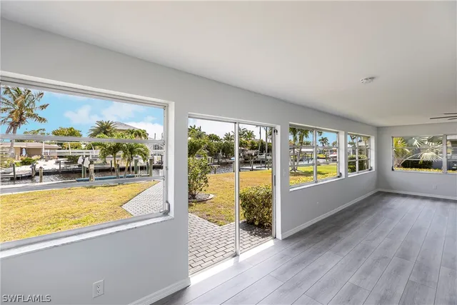 a view of a living room and dining room