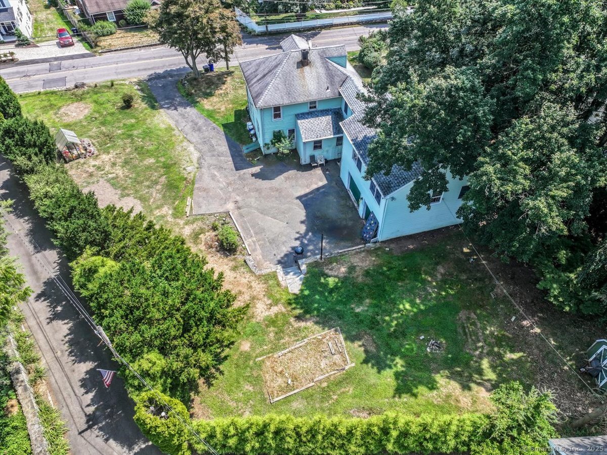 647 Bronson Road Fairfield, CT 06890 - Photo 10 of 10 an aerial view of house with yard