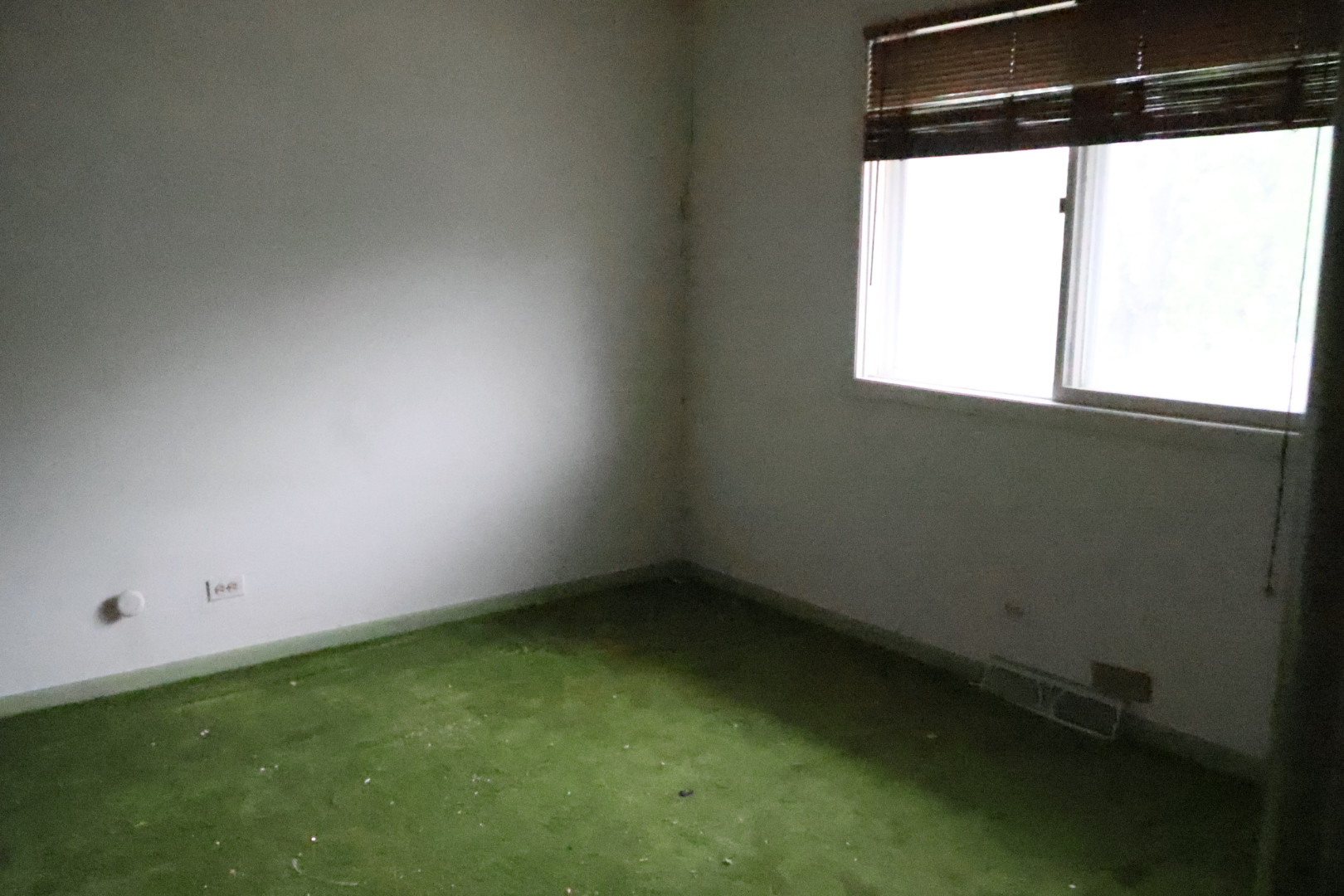 230 Douglass Way Bolingbrook, IL 60440 - Photo 6 of 16 a view of a window in an empty room