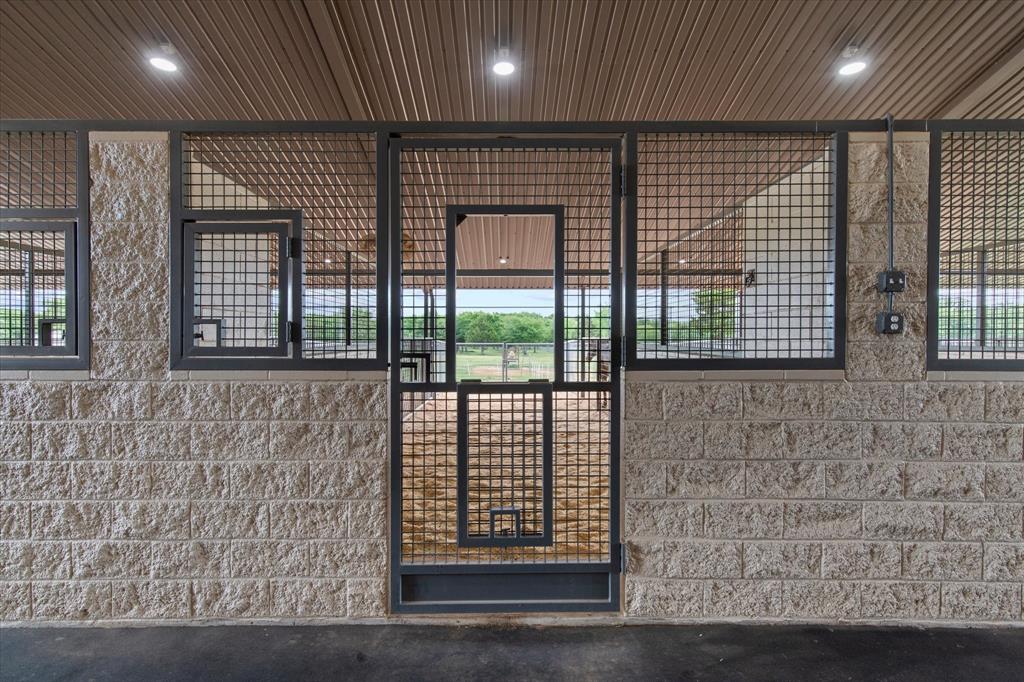 10701 Osburn Road Pilot Point, TX 76258 - Photo 24 of 37 Beautiful stone and wire mesh stall fronts
