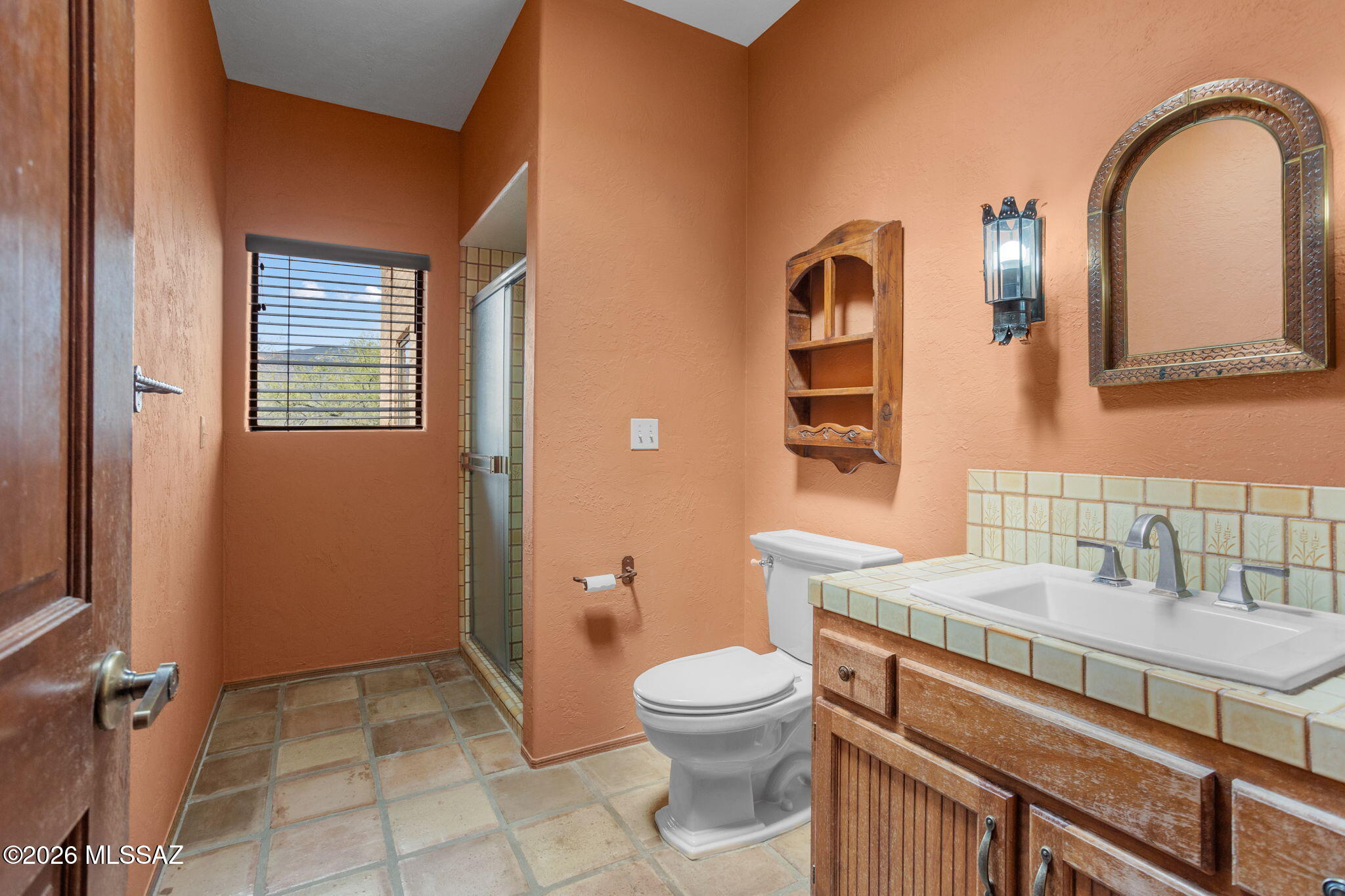 7171 South X9 Ranch Road Vail, AZ 85641 - Photo 39 of 50 Tiled Guest Bath 3 close to Bdrms 4 & 5. Wall shelf incl.