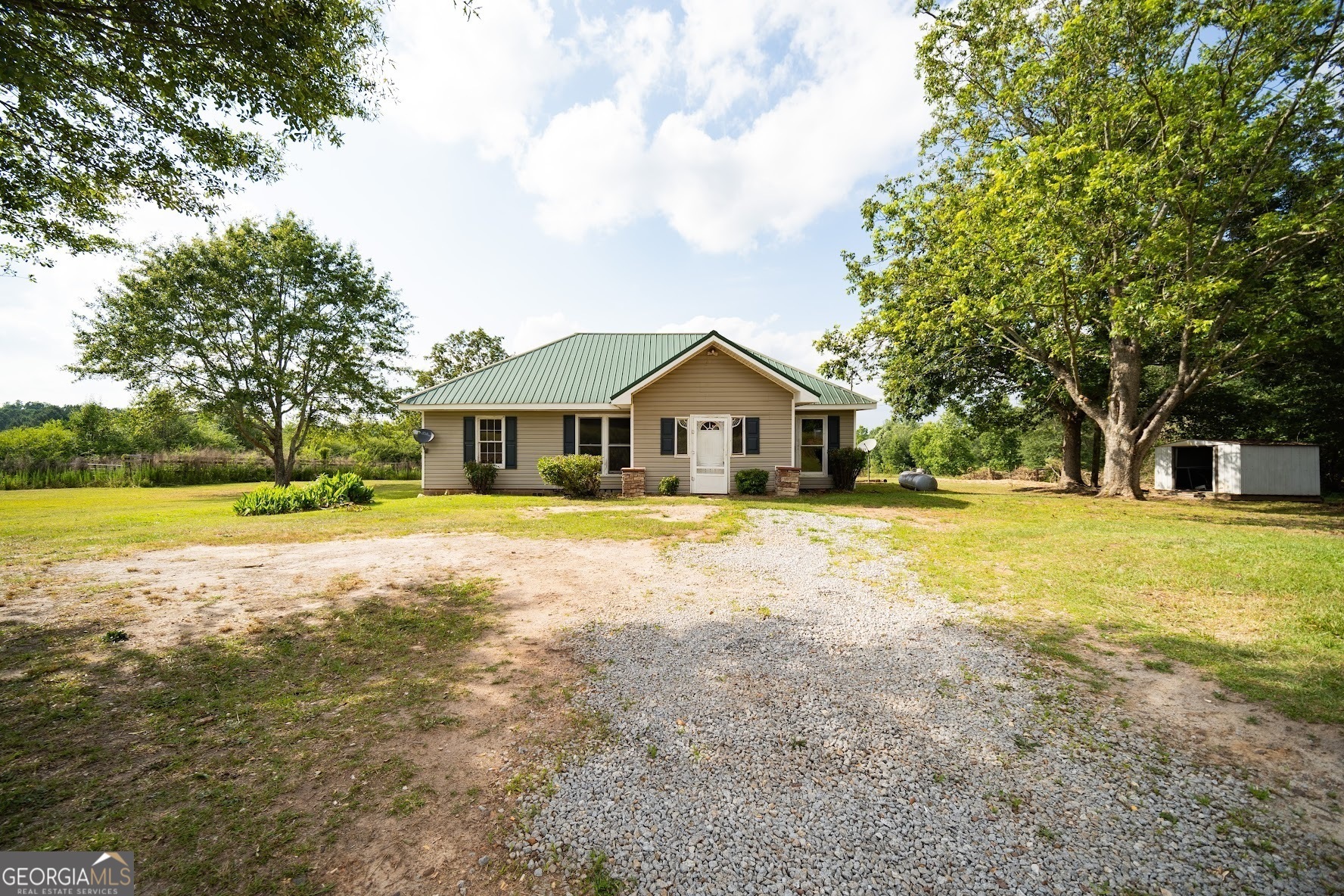 85 Bonner Goldmine Road Roopville, GA 30170 - Photo 1 of 1 a house with swimming pool in front of it