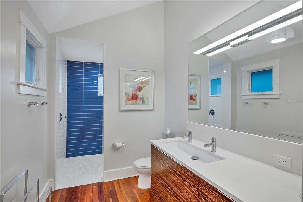 1716 Oak Street Sarasota, FL 34236 - Photo 13 of 49 a bath room with a sink and a mirror