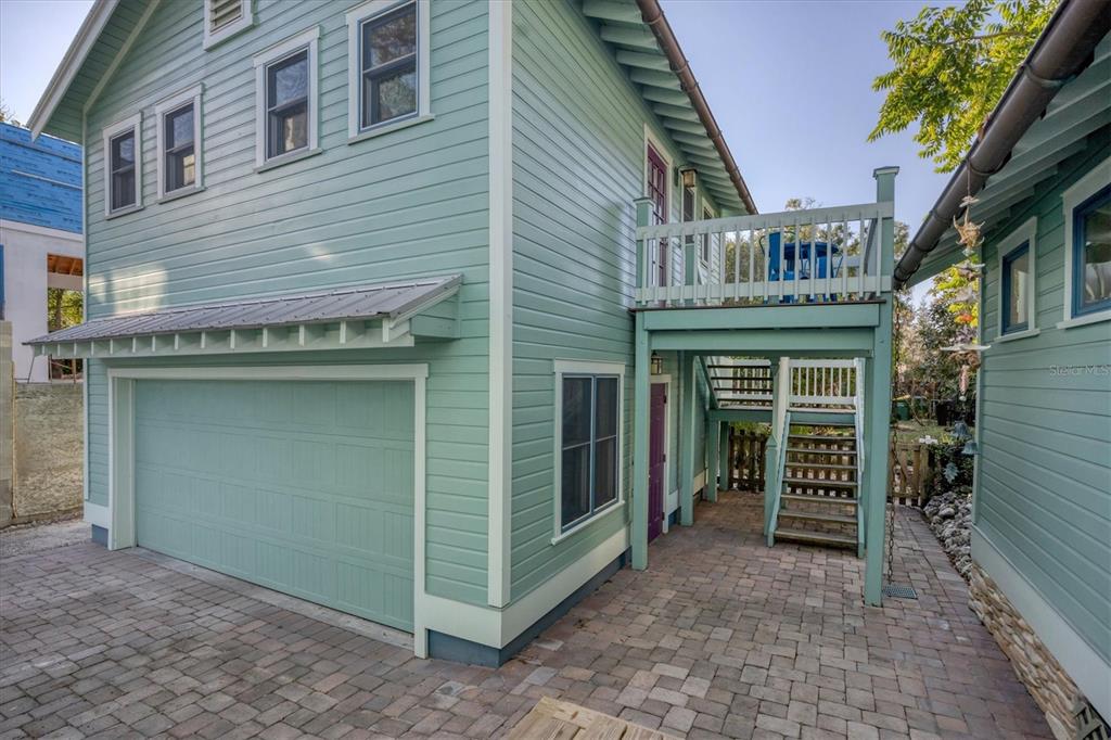 1716 Oak Street Sarasota, FL 34236 - Photo 20 of 49 a front view of a building with entryway