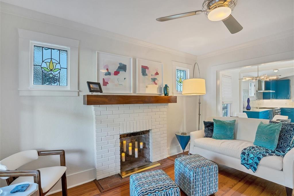 1716 Oak Street Sarasota, FL 34236 - Photo 4 of 49 a living room with furniture and a fireplace