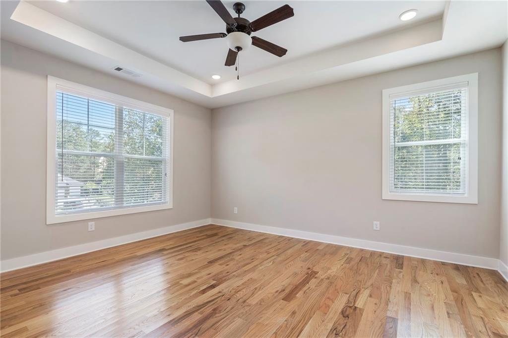 17 Pinoak Trail Cartersville, GA 30121 - Photo 20 of 37 a view of an empty room with wooden floor and a window
