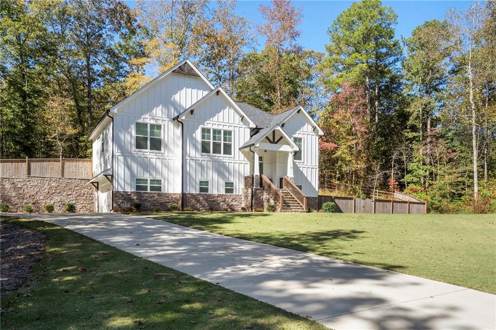 17 Pinoak Trail Cartersville, GA 30121 - Photo 2 of 37 a front view of a house with a yard