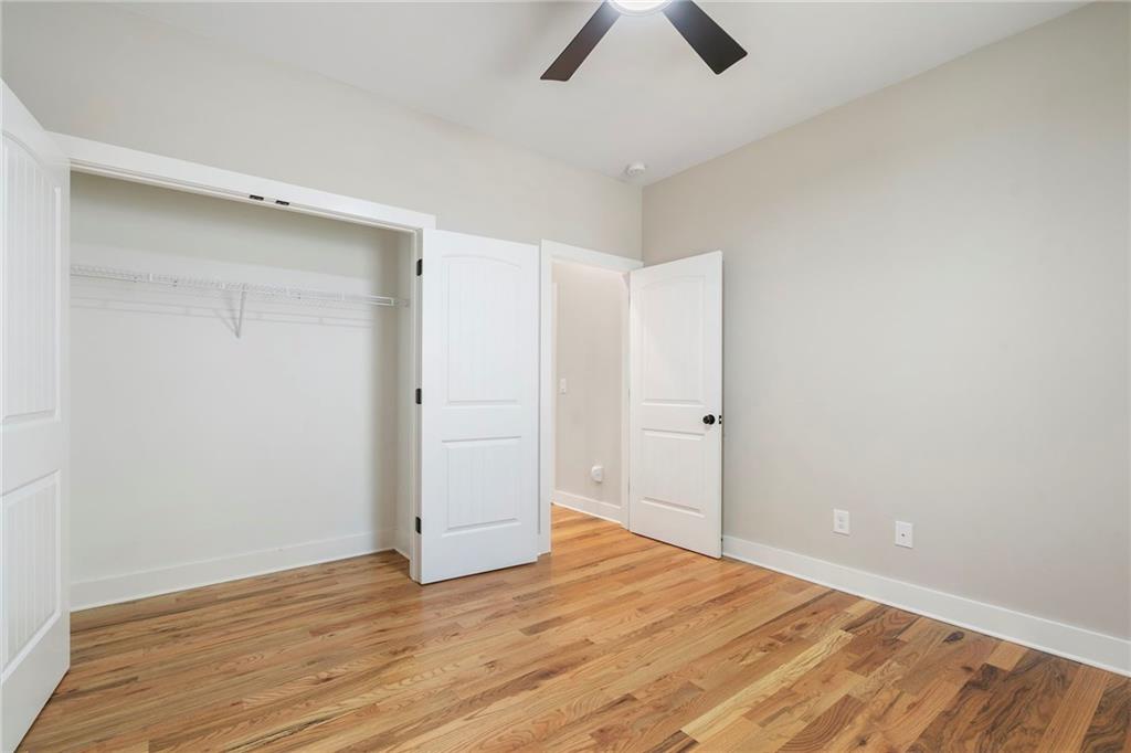 17 Pinoak Trail Cartersville, GA 30121 - Photo 25 of 37 an empty room with wooden floor and windows