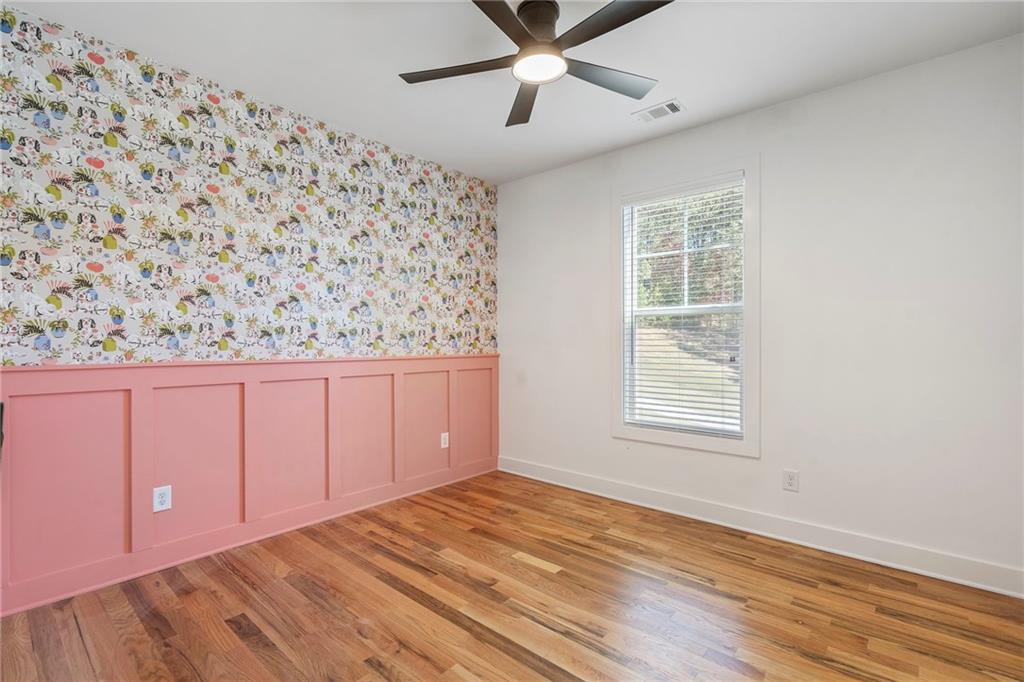 17 Pinoak Trail Cartersville, GA 30121 - Photo 27 of 37 an empty room with wooden floor closet and windows