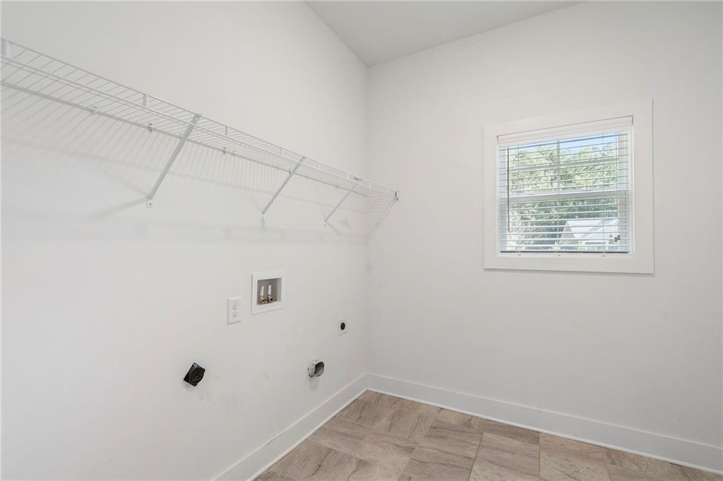 17 Pinoak Trail Cartersville, GA 30121 - Photo 33 of 37 a view of a small space with racks on the wall