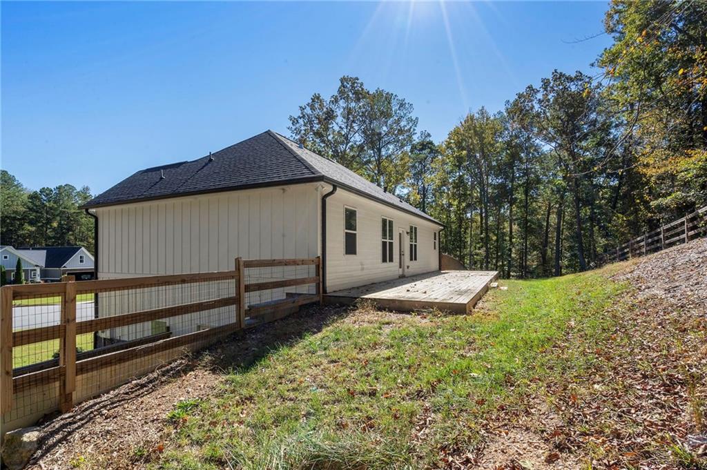 17 Pinoak Trail Cartersville, GA 30121 - Photo 36 of 37 a view of a house with a yard