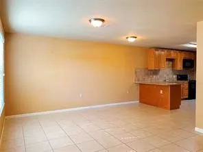 a view of a kitchen with a sink