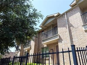10064 Emnora Lane Houston, TX 77080 - Photo 22 of 31 a view of a house with a large window