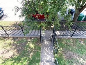 10064 Emnora Lane Houston, TX 77080 - Photo 23 of 31 a view of a yard with a tree