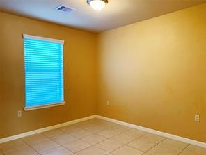 10064 Emnora Lane Houston, TX 77080 - Photo 8 of 31 a view of a room with a window