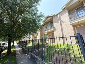 10064 Emnora Lane Houston, TX 77080 - Photo 9 of 31 a view of a balcony with tree