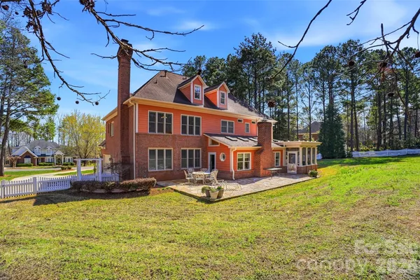 a view of a house with swimming pool
