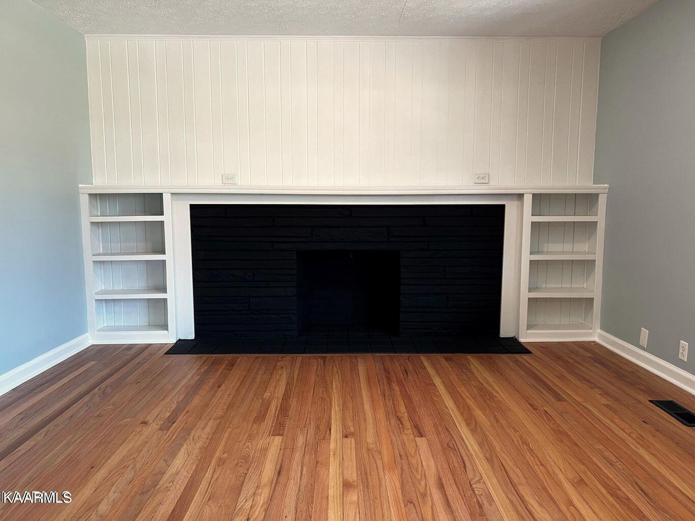 5725 Kentwood Road Knoxville, TN 37912 - Photo 8 of 31 Fireplace with Built-In Shelves