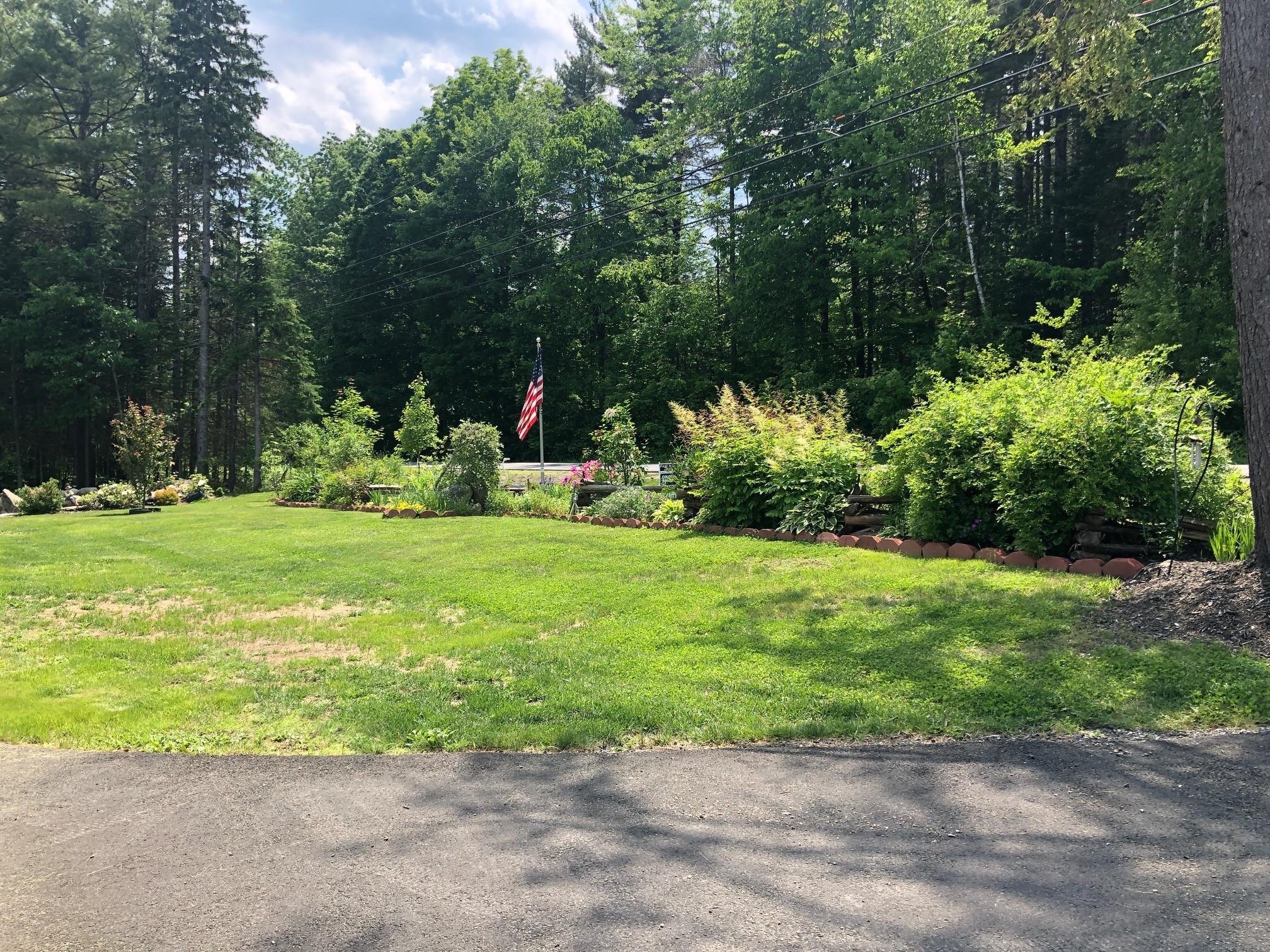 554 Cook Road Carmel, ME 04419 - Photo 6 of 34 Flagpole & Gardens
