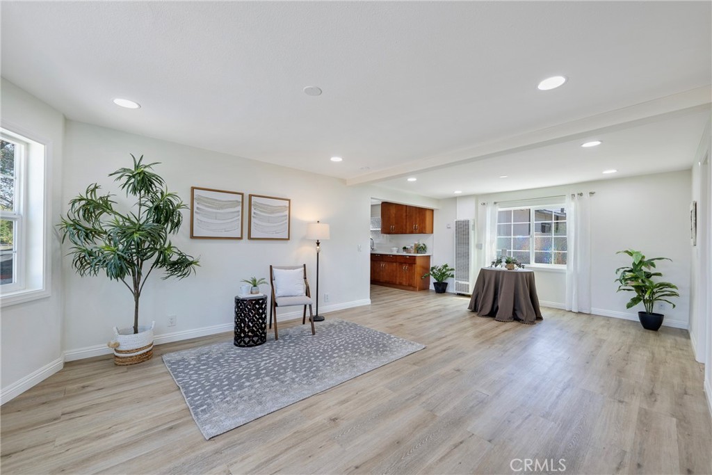 3751 McKenzie Street Riverside, CA 92503 - Photo 14 of 68 a living room with furniture potted plant and wooden floor