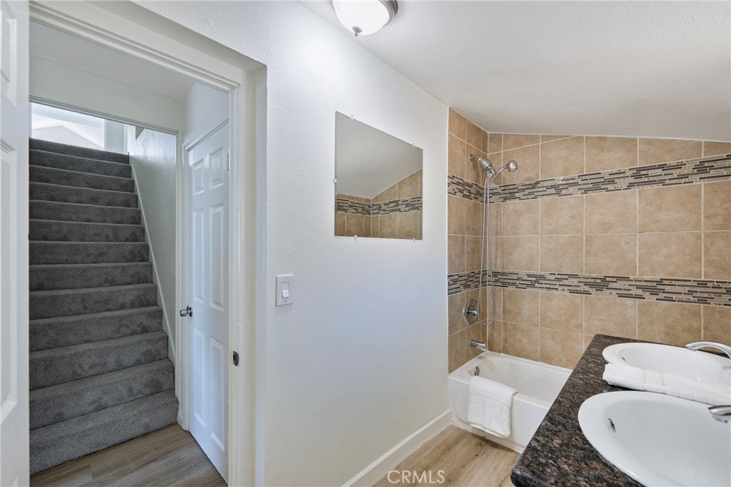 3751 McKenzie Street Riverside, CA 92503 - Photo 32 of 68 a bathroom with a toilet and a shower