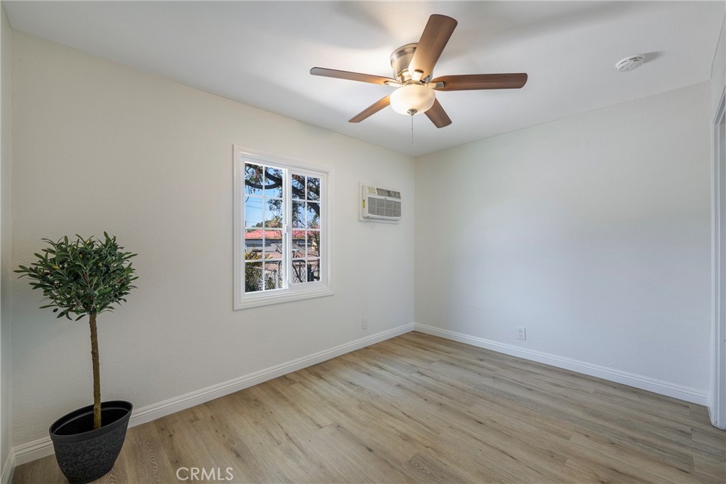 3751 McKenzie Street Riverside, CA 92503 - Photo 33 of 68 a view of a workspace with furniture and a potted plant