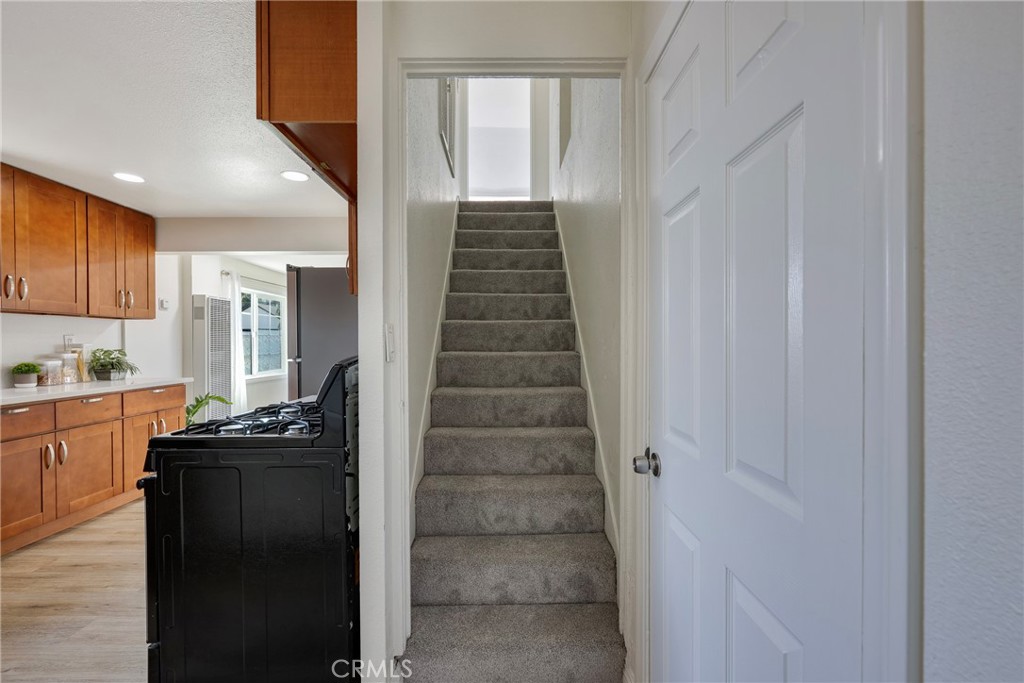 3751 McKenzie Street Riverside, CA 92503 - Photo 34 of 68 a kitchen with granite countertop a sink and a stove