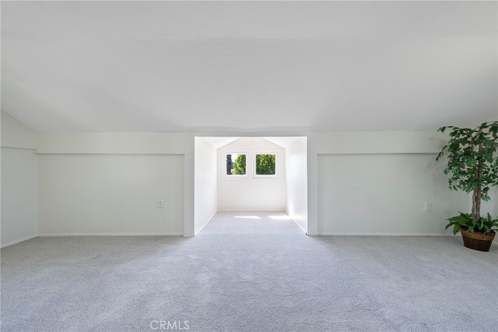 3751 McKenzie Street Riverside, CA 92503 - Photo 35 of 68 an empty room with potted plants and empty space