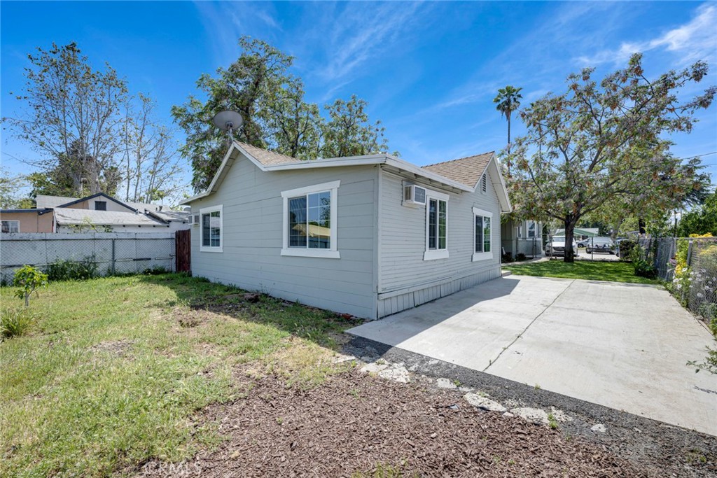 3751 McKenzie Street Riverside, CA 92503 - Photo 61 of 68 a view of a house with a yard